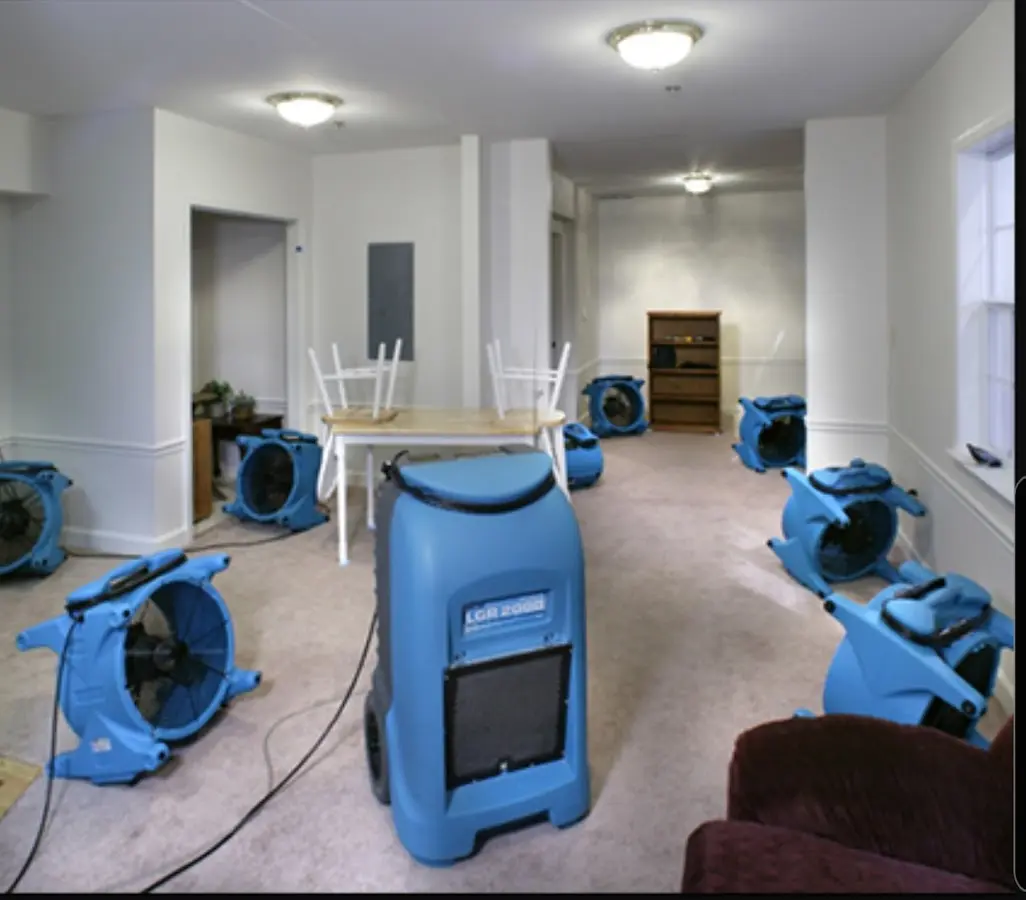 Air movers and dehumidifier setup for Water Damage Restoration in Carnegie